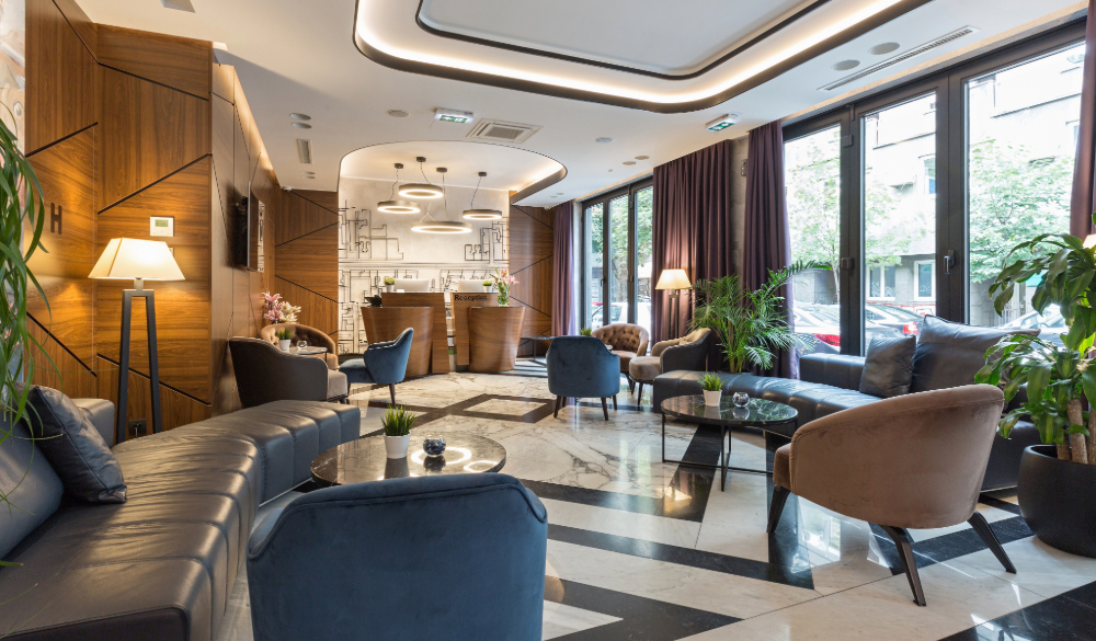 The interior of a modern luxury hotel reception. 