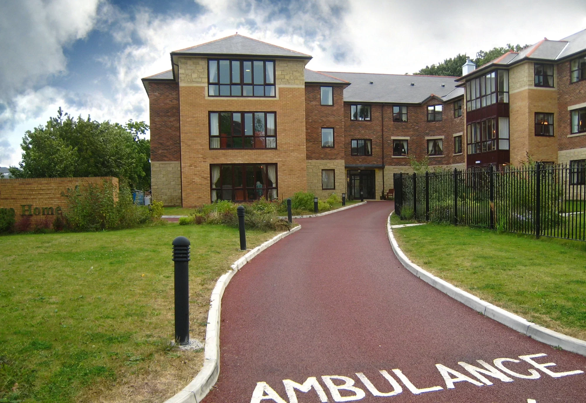 Exterior of a care home facility in the UK.